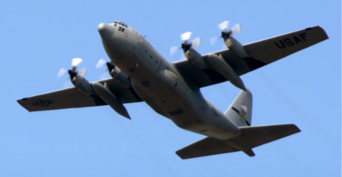 Photo of a Lockheed C-130E in flight ((National Museum of the U.S. Air Force)